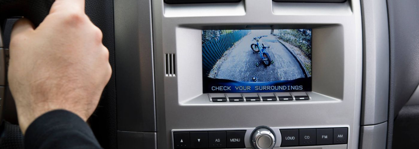 Car's backup camera capturing bicycle behind car.